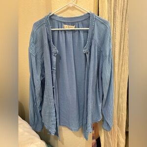 We the free moving mountains button down top